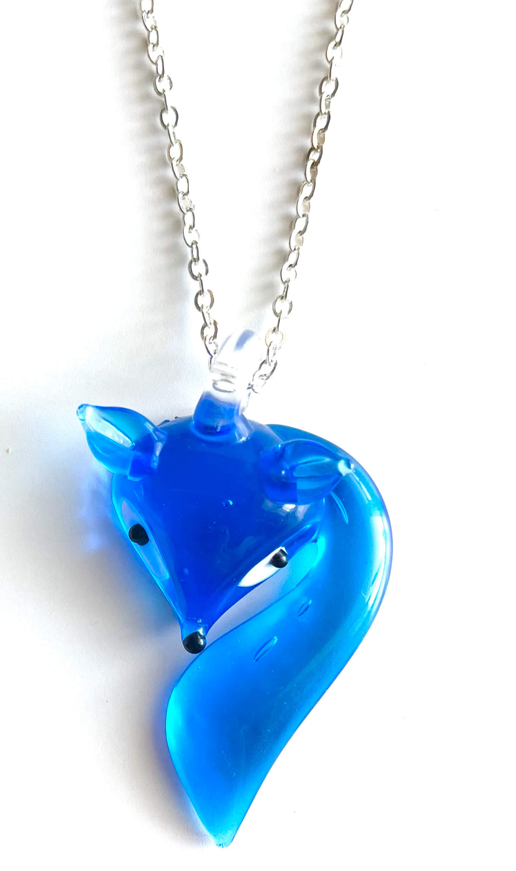 Blue fox-shaped pendant on a chain against a white background